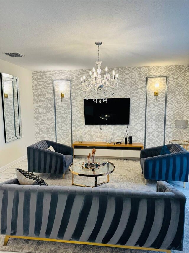 851 Drop Shot Dr, Davenport, FL 33896 - living room with a chandelier and baseboards