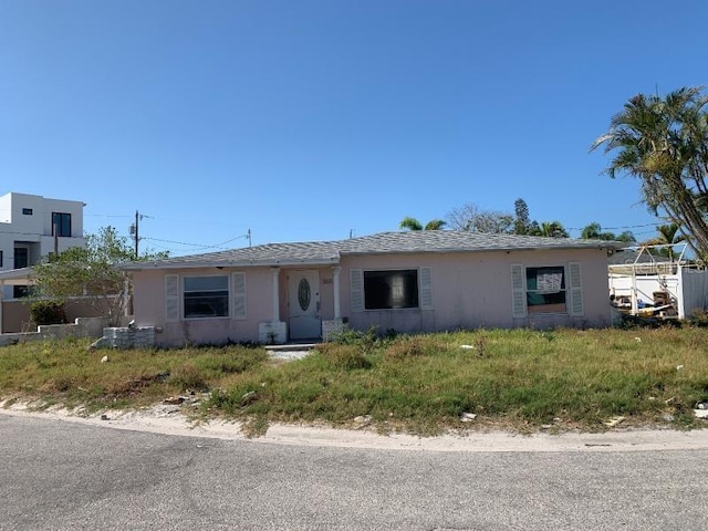 365 145th Ave E, Madeira Beach, FL 33708 - view of front facade with stucco siding