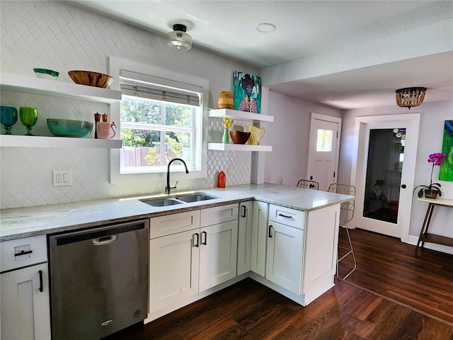 420 61st Ave S, Saint Petersburg, FL 33705 - kitchen featuring dishwasher, open shelves, a sink, dark wood-style floors, and a peninsula