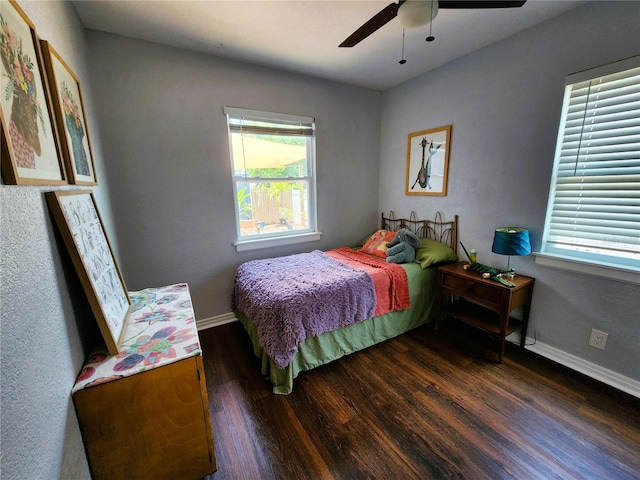 420 61st Ave S, Saint Petersburg, FL 33705 - bedroom with wood finished floors, a ceiling fan, and baseboards