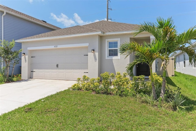 4122 Sagefield Dr, Saint Cloud, FL 34773 - view of front of house with an attached garage, stucco siding, concrete driveway, a front yard, and a shingled roof