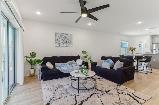 4122 Sagefield Dr, Saint Cloud, FL 34773 - living room featuring light wood-type flooring, a ceiling fan, and recessed lighting