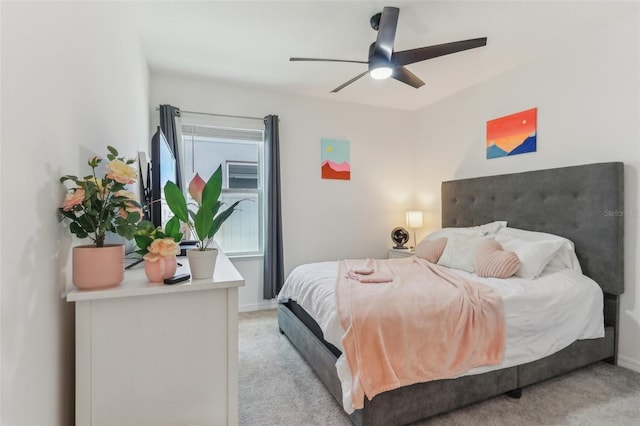 4122 Sagefield Dr, Saint Cloud, FL 34773 - bedroom with light colored carpet, a ceiling fan, and baseboards