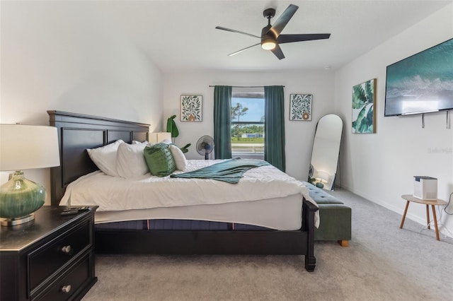 4122 Sagefield Dr, Saint Cloud, FL 34773 - bedroom with light colored carpet, a ceiling fan, and baseboards