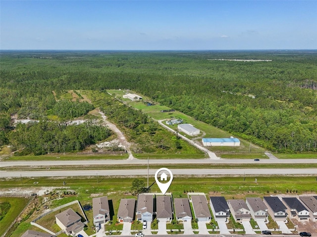 4122 Sagefield Dr, Saint Cloud, FL 34773 - view of property location featuring a heavily wooded area and nearby suburban area