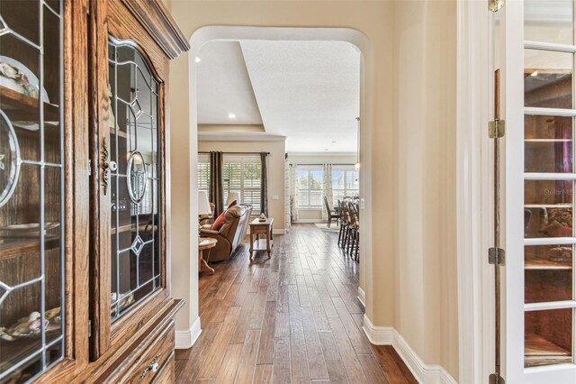 4133 Foxhound Dr, Clermont, FL 34711 - entrance foyer with baseboards and dark wood-style flooring
