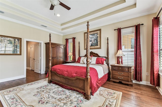 4133 Foxhound Dr, Clermont, FL 34711 - bedroom featuring a raised ceiling, wood-type flooring, ornamental molding, ceiling fan, and recessed lighting
