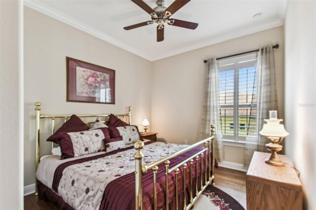4133 Foxhound Dr, Clermont, FL 34711 - bedroom with wood finished floors, crown molding, and a ceiling fan