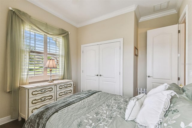 4133 Foxhound Dr, Clermont, FL 34711 - bedroom with crown molding and a closet