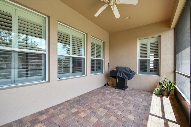 4133 Foxhound Dr, Clermont, FL 34711 - view of patio featuring a ceiling fan and a grill