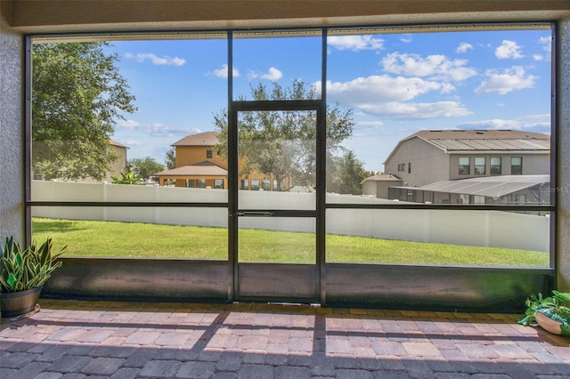 4133 Foxhound Dr, Clermont, FL 34711 - unfurnished sunroom with a residential view