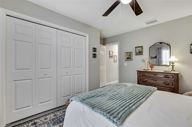 5755 N Summerfield Pt, Citrus Springs, FL 34434 - bedroom featuring a closet and ceiling fan