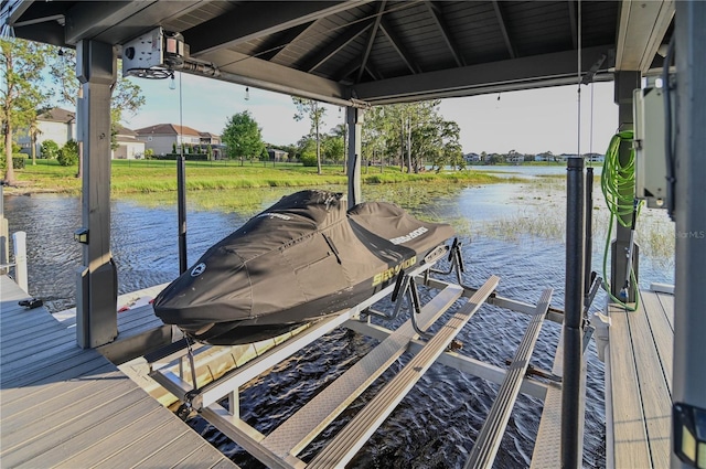 7550 John Hancock Dr, Winter Garden, FL 34787 - dock featuring boat lift and a water view