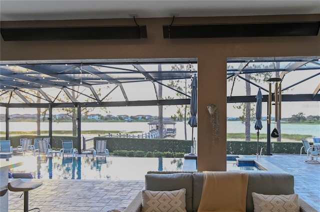 7550 John Hancock Dr, Winter Garden, FL 34787 - view of patio with an outdoor pool, a hot tub, an outdoor living space, glass enclosure, and a water view
