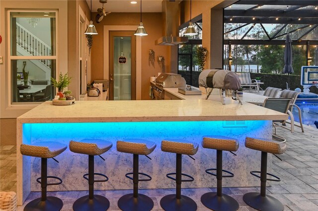 7550 John Hancock Dr, Winter Garden, FL 34787 - view of patio / terrace featuring glass enclosure and an outdoor pool
