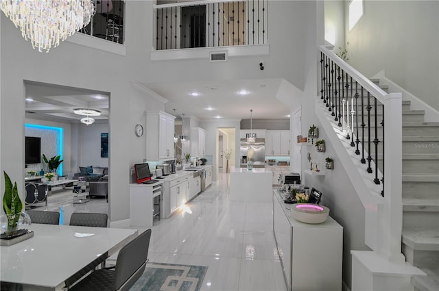 7550 John Hancock Dr, Winter Garden, FL 34787 - entrance foyer with stairs, a high ceiling, and recessed lighting