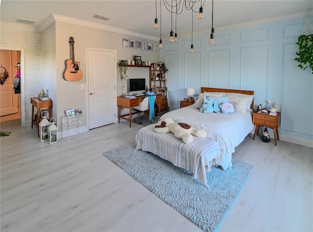 7550 John Hancock Dr, Winter Garden, FL 34787 - bedroom with light wood finished floors, ornamental molding, baseboards, and a desk