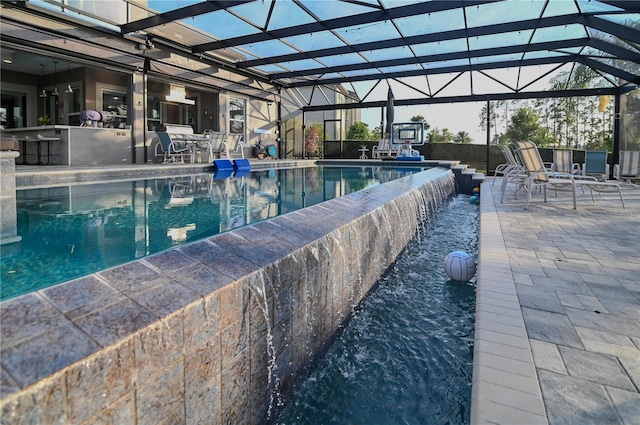 7550 John Hancock Dr, Winter Garden, FL 34787 - view of swimming pool with a patio area, an infinity pool, and glass enclosure