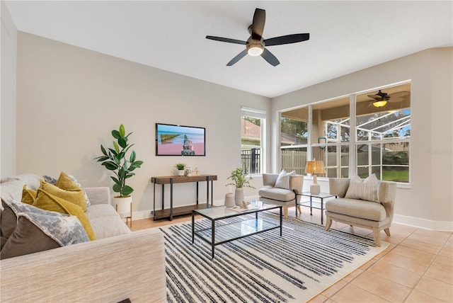 4993 Hook Hollow Cir, Orlando, FL 32837 - living area with ceiling fan, baseboards, and light tile patterned flooring