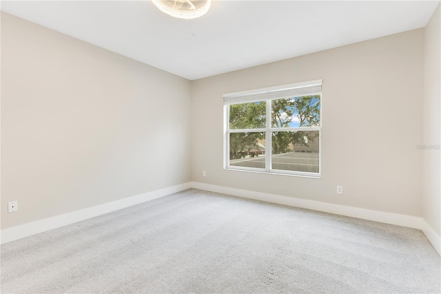 4993 Hook Hollow Cir, Orlando, FL 32837 - empty room with baseboards and light carpet
