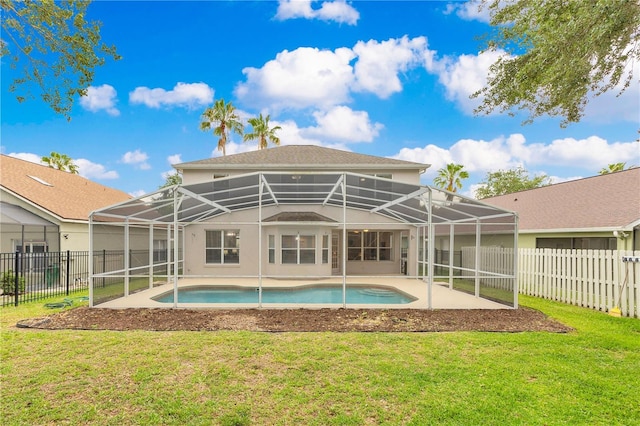 4993 Hook Hollow Cir, Orlando, FL 32837 - rear view of property featuring a patio area, glass enclosure, and stucco siding