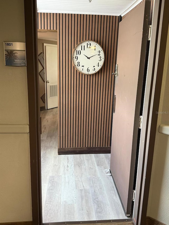 6165 Carrier Dr Unit 1801, Orlando, FL 32819 - corridor featuring wood finished floors