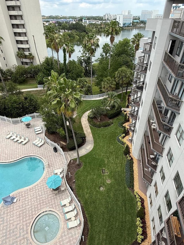 6165 Carrier Dr Unit 1801, Orlando, FL 32819 - view of property's community with a water view and a pool