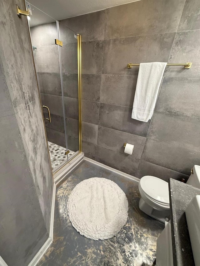 6165 Carrier Dr Unit 1801, Orlando, FL 32819 - bathroom featuring a stall shower, toilet, concrete flooring, and vanity