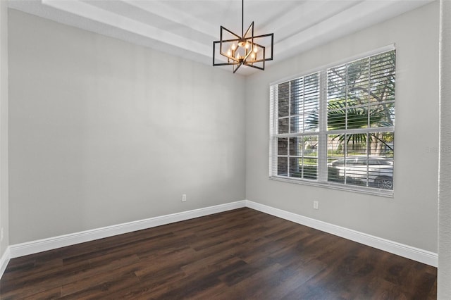 461 Black Knight Way, Longwood, FL 32779 - empty room with a chandelier, plenty of natural light, dark wood-style floors, and baseboards