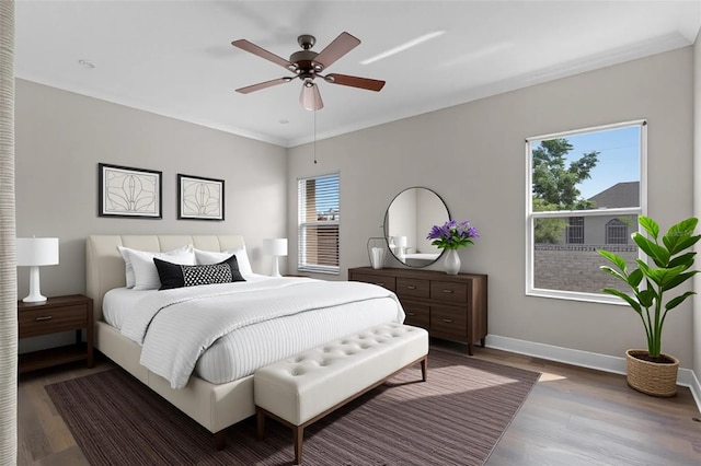 461 Black Knight Way, Longwood, FL 32779 - bedroom with wood finished floors, baseboards, ornamental molding, and a ceiling fan