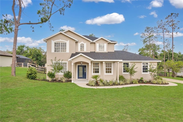 17657 Windy Pine St, Montverde, FL 34756 - traditional-style home featuring stucco siding and a shingled roof