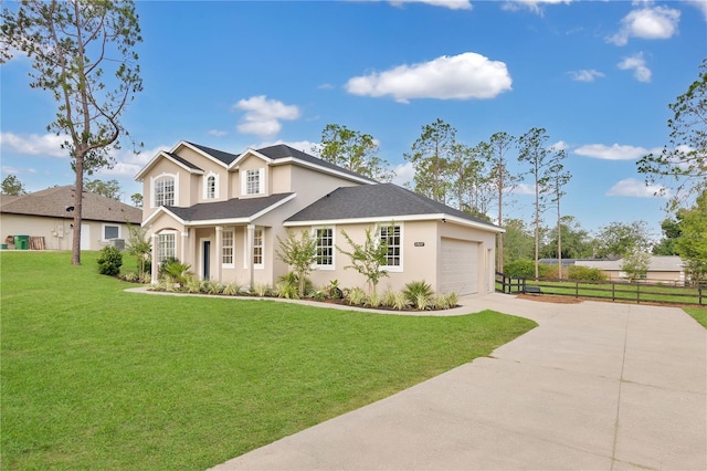 17657 Windy Pine St, Montverde, FL 34756 - view of front of house with driveway, stucco siding, a garage, and roof with shingles