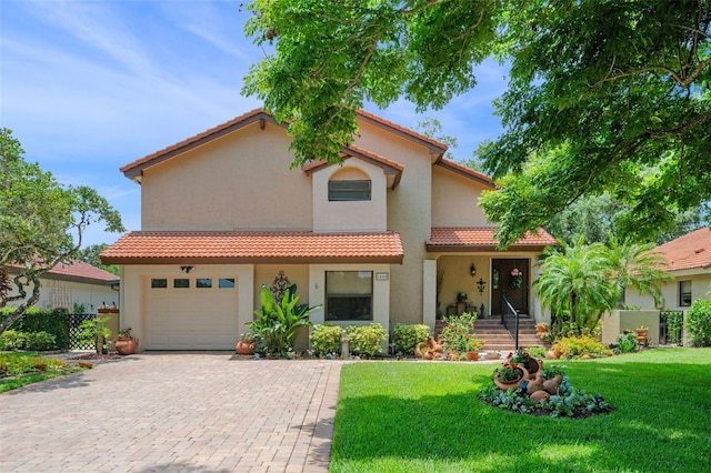 6460 Parson Brown Dr, Orlando, FL 32819 - mediterranean / spanish-style home with stucco siding, decorative driveway, a tiled roof, and a porch