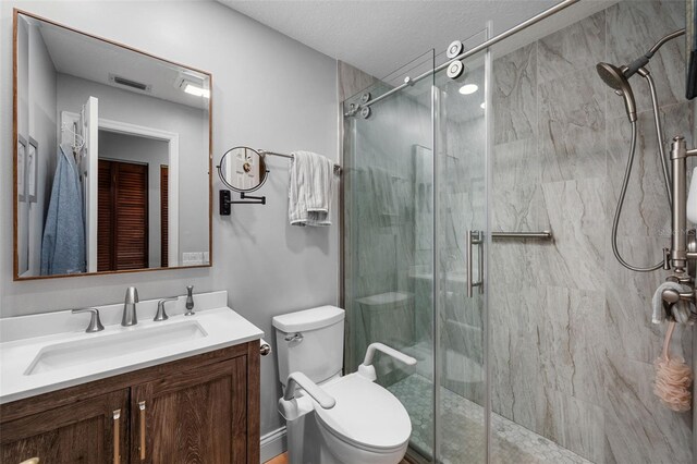 6460 Parson Brown Dr, Orlando, FL 32819 - full bath featuring vanity, a marble finish shower, and toilet