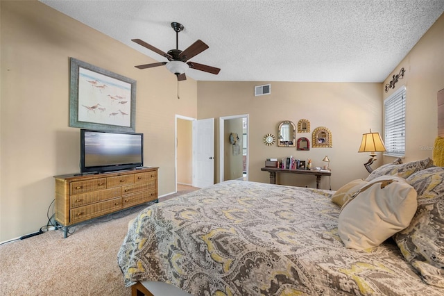 6460 Parson Brown Dr, Orlando, FL 32819 - carpeted bedroom featuring vaulted ceiling, a textured ceiling, and ceiling fan