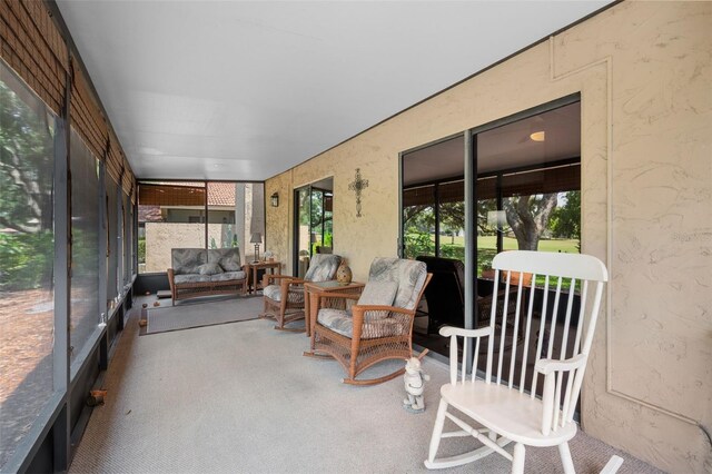 6460 Parson Brown Dr, Orlando, FL 32819 - sunroom with an outdoor living space