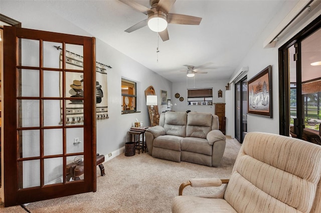 6460 Parson Brown Dr, Orlando, FL 32819 - living room featuring carpet, ceiling fan, and baseboards