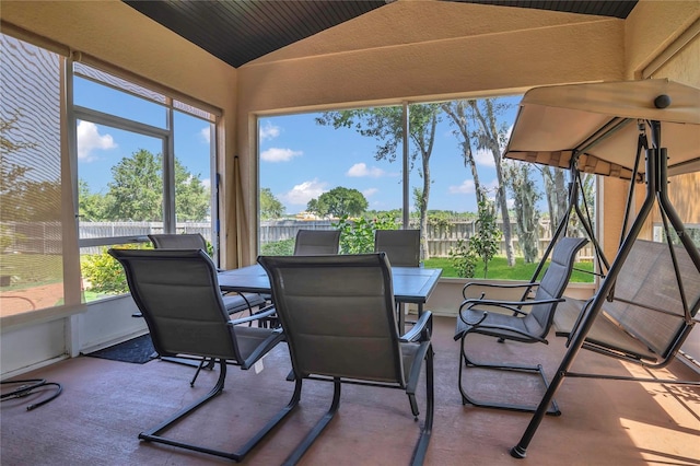 2100 Shantiniketan Blvd, Tavares, FL 32778 - sunroom featuring lofted ceiling, plenty of natural light, and outdoor dining area