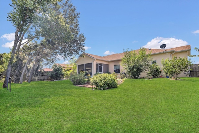 2100 Shantiniketan Blvd, Tavares, FL 32778 - view of yard with a sunroom