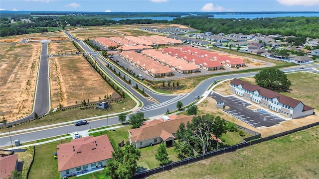 2100 Shantiniketan Blvd, Tavares, FL 32778 - aerial perspective of suburban area with a nearby body of water