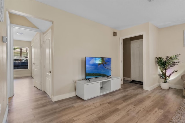 500 W Oakland Ave, Oakland, FL 34760 - living room with light wood-style flooring and baseboards