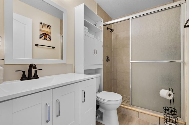 500 W Oakland Ave, Oakland, FL 34760 - full bathroom featuring toilet, vanity, and a shower stall