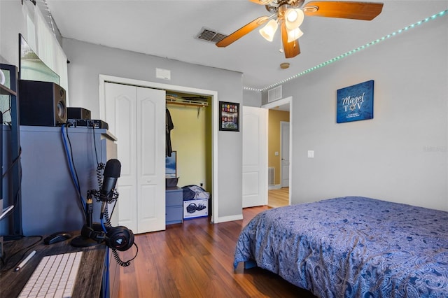 500 W Oakland Ave, Oakland, FL 34760 - bedroom featuring wood finished floors, a closet, and ceiling fan