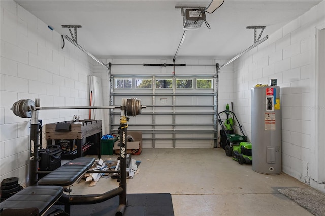 500 W Oakland Ave, Oakland, FL 34760 - garage featuring electric water heater, a garage door opener, and concrete block wall