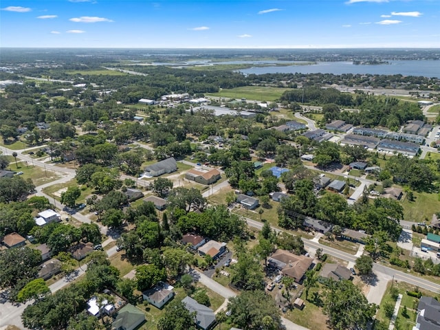 500 W Oakland Ave, Oakland, FL 34760 - aerial view of property and surrounding area featuring a large body of water and nearby suburban area