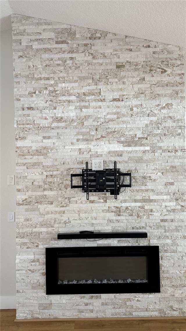 6428 Lynn Rd, Orlando, FL 32810 - detailed view of a fireplace and wood finished floors