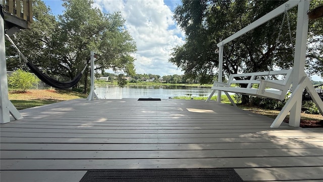 6428 Lynn Rd, Orlando, FL 32810 - wooden deck with a water view
