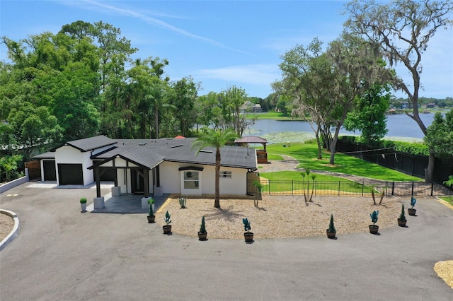 1700 Lake Markham Rd, Sanford, FL 32771 - view of front of house featuring a water view and stucco siding