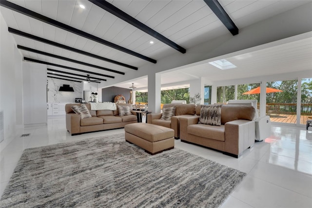 1700 Lake Markham Rd, Sanford, FL 32771 - tiled living area with plenty of natural light, wood ceiling with exposed beams, and recessed lighting