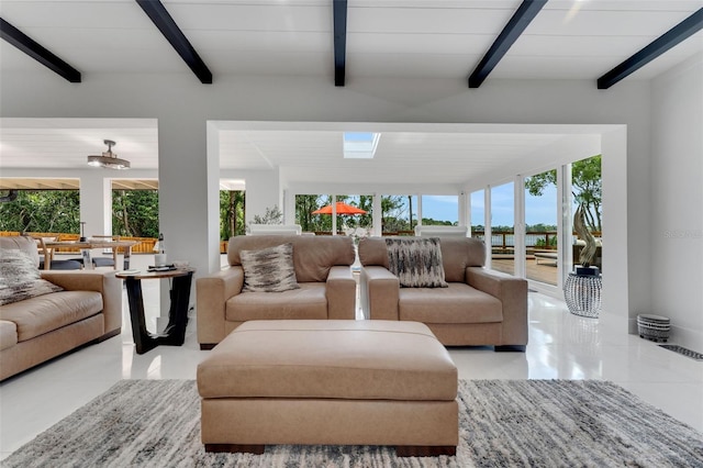 1700 Lake Markham Rd, Sanford, FL 32771 - living room with beam ceiling and tile patterned flooring